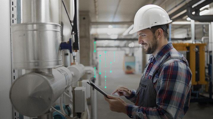 A person wearing a hard hat and holding a tablet
AI-generated content may be incorrect.